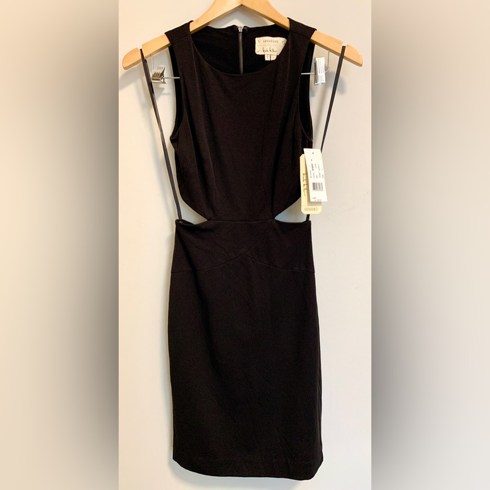 Never worn, with tags Black dress with back cut-out